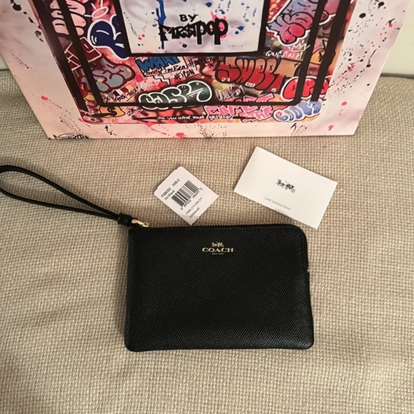 Coach black leather corner zip wristlet. - Picture 3 of 8